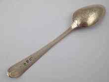 Appraisal: A Georgian Old English pattern brightcut front galleon pictureback teaspoon