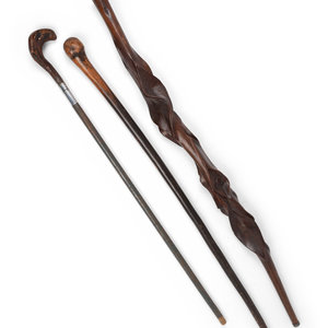 Appraisal: Three Carved Walnut Walking Sticks th th Century Length of