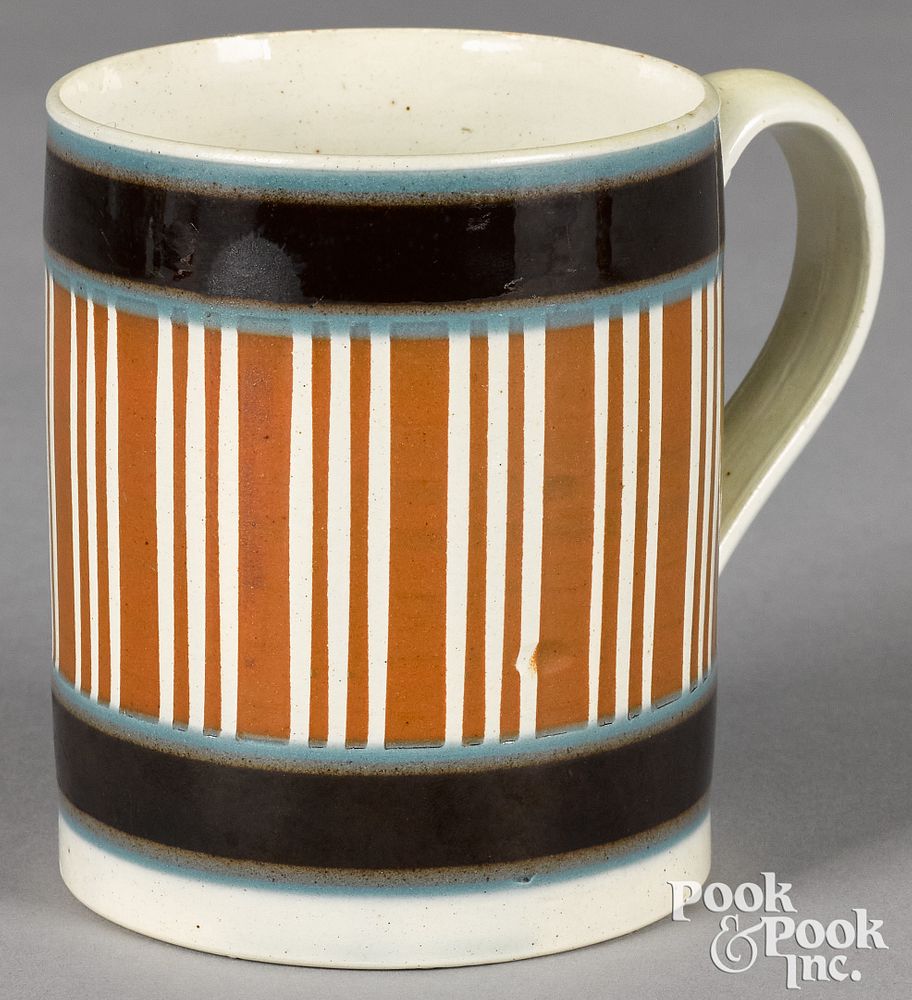 Appraisal: Small mocha mug Small mocha mug with vertical brown and