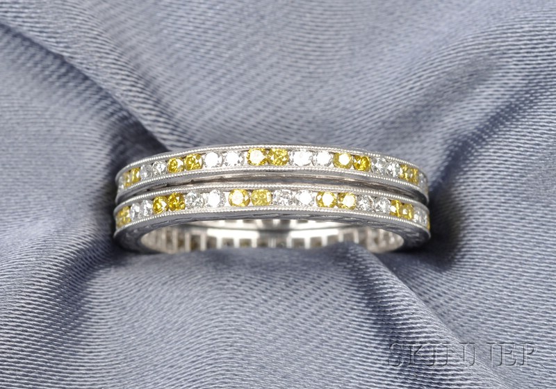 Appraisal: Pair of Platinum Colored Diamond and Diamond Bands each set