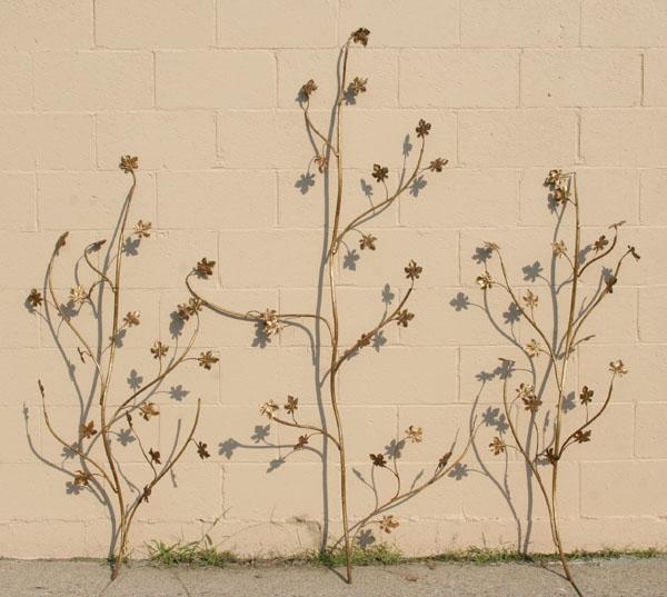 Appraisal: Mid Century modern three piece brass wall decor of leafy