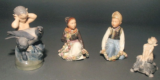 Appraisal: Four Royal Copenhagen figural groups h h h h