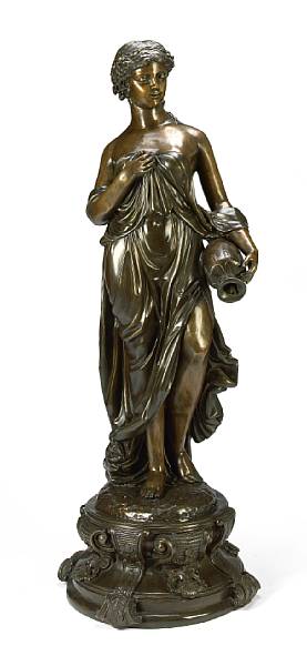 Appraisal: A patinated bronze figure of a water carrier The standing