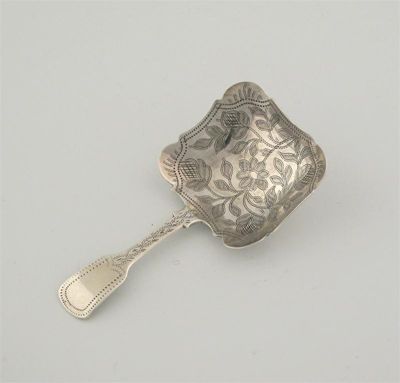 Appraisal: A William IV fiddle pattern spoon shaped oblong bowl centred