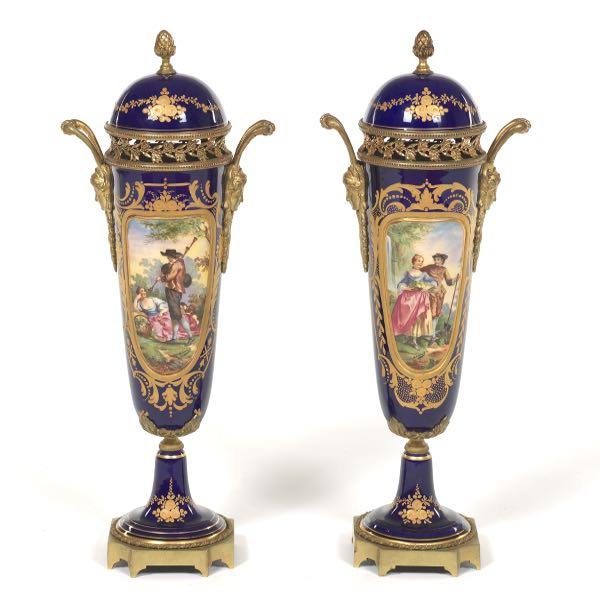 Appraisal: PAIR OF SEVRES STYLE PORCELAIN AND D'ORE BRONZE LIDDED SCENIC