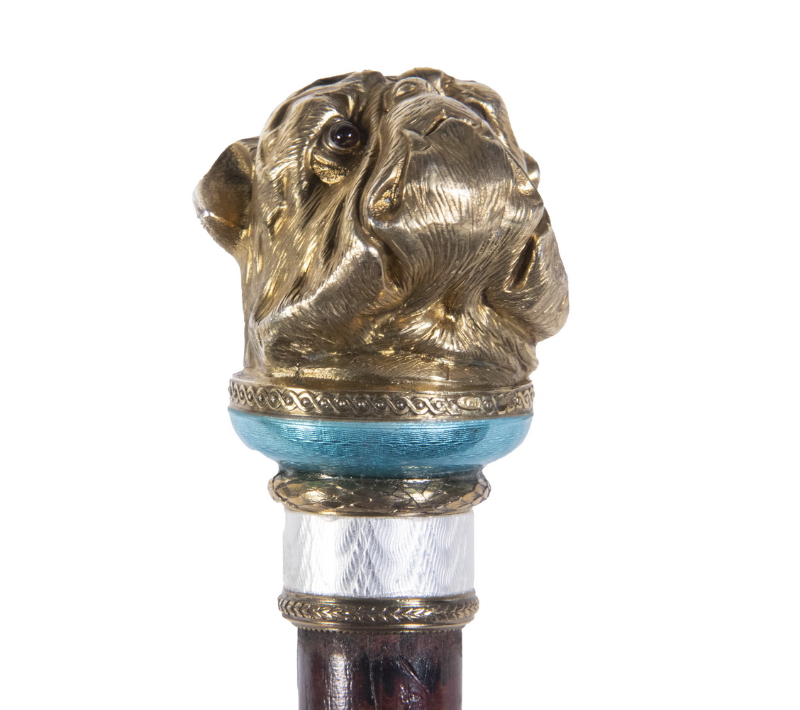 Appraisal: RUSSIAN SILVER MOUNTED CANE Bulldog head cane -silver with cabochon