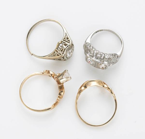 Appraisal: A collection of three diamond platinum and k gold rings