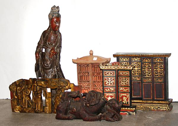 Appraisal: A group of Chinese wood decorations Including a standing wood