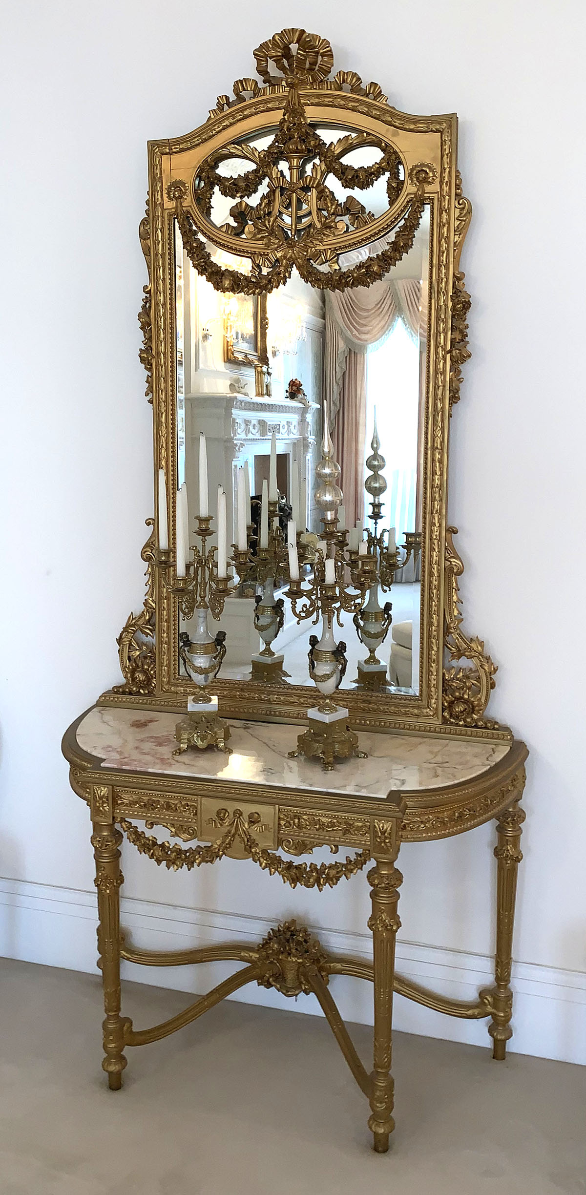 Appraisal: FLORENTINE CARVED MARBLE TOP FOYER TABLE MIRROR Carved Gilt foyer