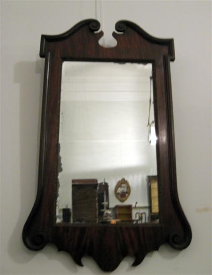 Appraisal: George III mahogany mirror The rectangular mirror plate enclosed by