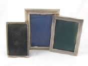 Appraisal: Three silver photo frames one hallmarked sterling two marked largest