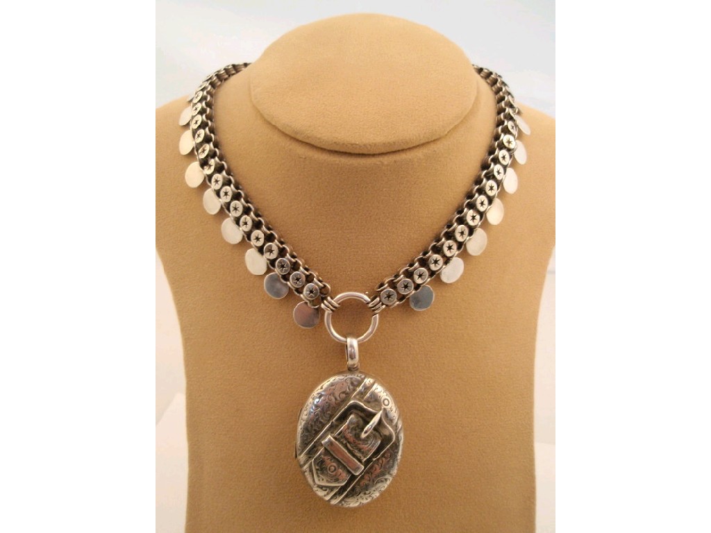 Appraisal: A Victorian silver belted locket and ornate choker chain