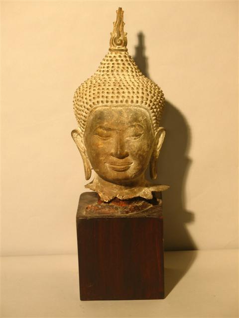 Appraisal: THAI BRONZE HEAD OF THE BUDDHA Cast with a serene