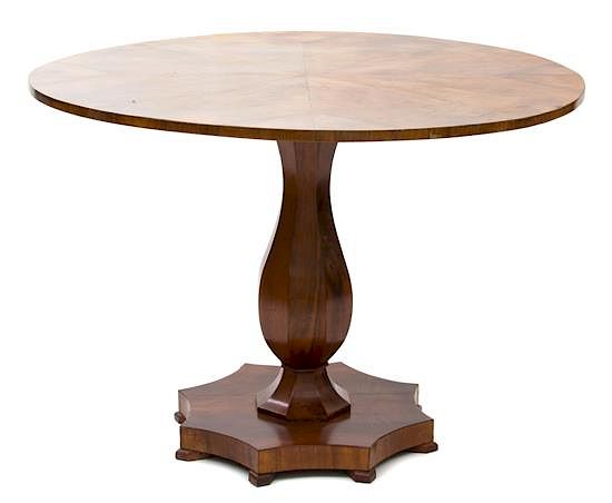 Appraisal: A Biedermeier Walnut Center Table Height x diameter inches A