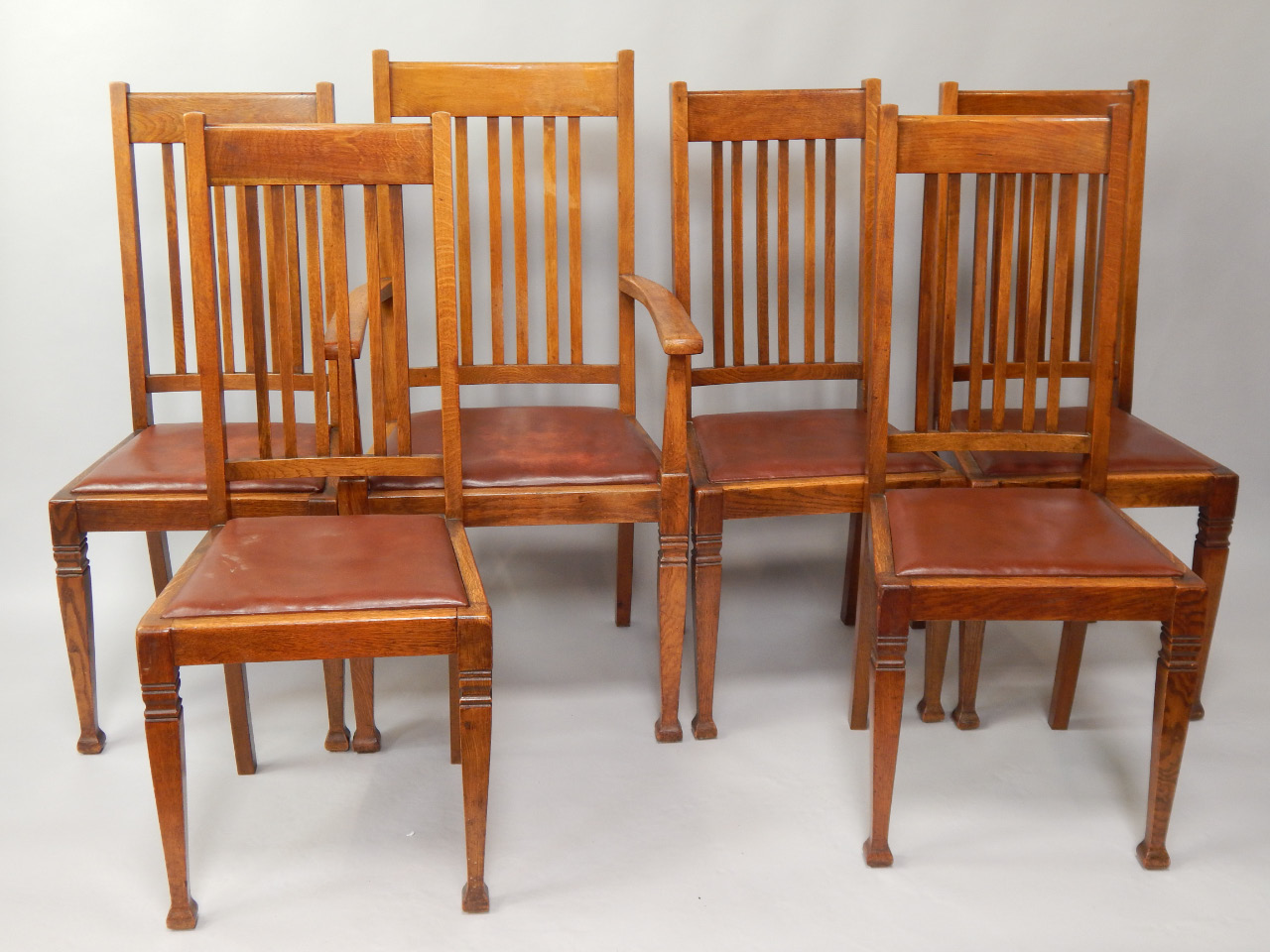 Appraisal: A set of six Edwardian oak dining chairs including carver