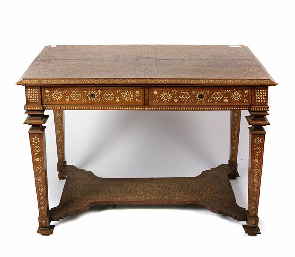 Appraisal: A Moorish style bone inlaid walnut center table height in