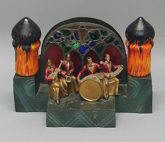 Appraisal: Four-piece band on green finished cast metal bandstand leaded glass