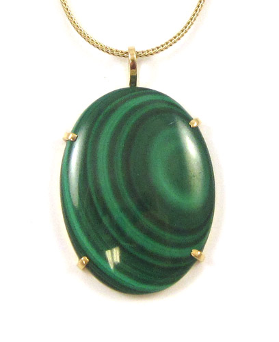 Appraisal: MALACHITE AND FOURTEEN KARAT GOLD PENDANT NECKLACE suspended on a