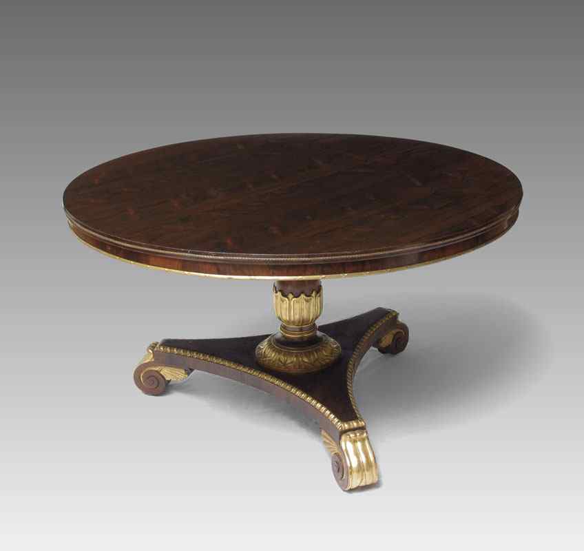 Appraisal: REGENCY ROSEWOOD TILT TOP CENTER TABLE Tilt top with ormolu