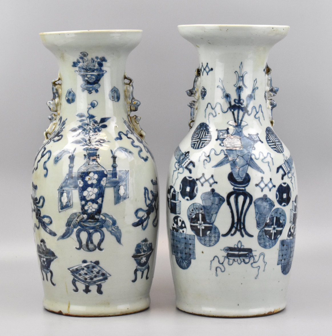 Appraisal: Two Chinese celadon glaze black white vases with handles th