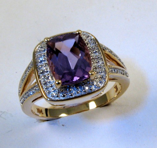 Appraisal: AMETHYST AND DIAMOND RING k gold and set with a