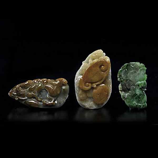 Appraisal: Chinese Jade Carvings Chinese Three jade carved pendants including a