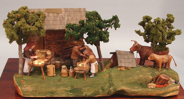 Appraisal: John Dale carving depicting farmers preparing food Artist American -