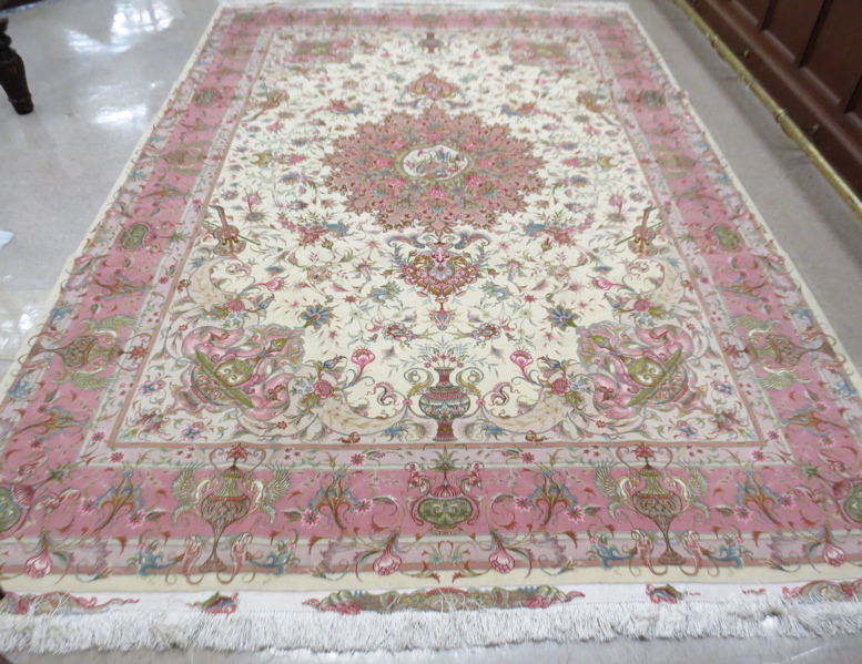 Appraisal: A CONTEMPORARY PERSIAN WOOL AND SILK CARPET hand knotted in