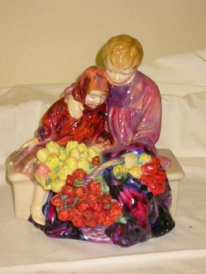 Appraisal: A ROYAL DOULTON CHINA FIGURE GROUP Flower Seller's Children designed