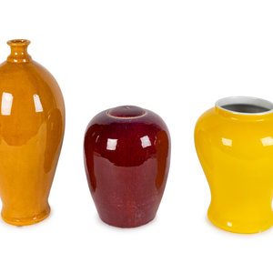 Appraisal: Three Contemporary Glazed Pottery Vessels TH CENTURY Orange yellow and