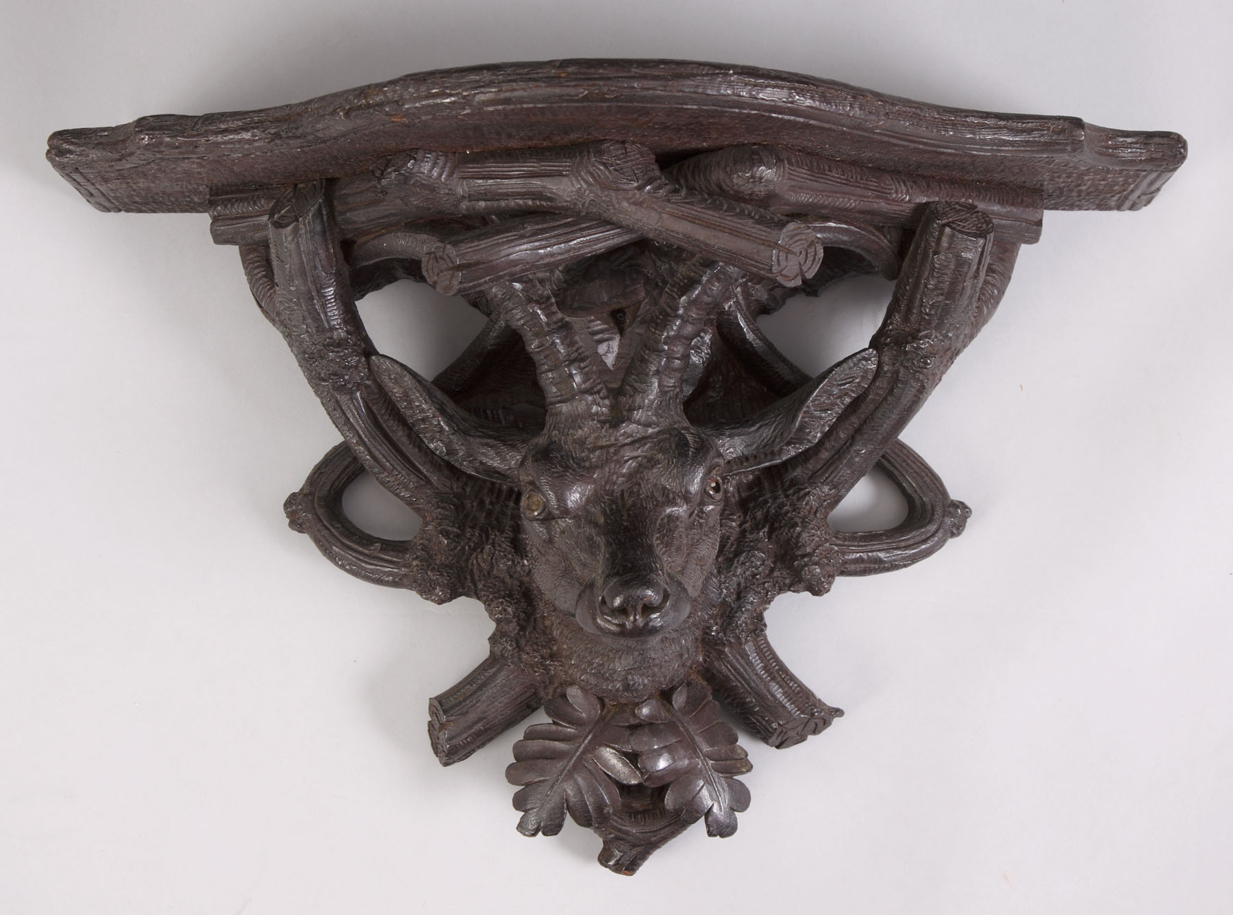 Appraisal: th Cent Carved Walnut Black Forest Shelf Original finish Ht