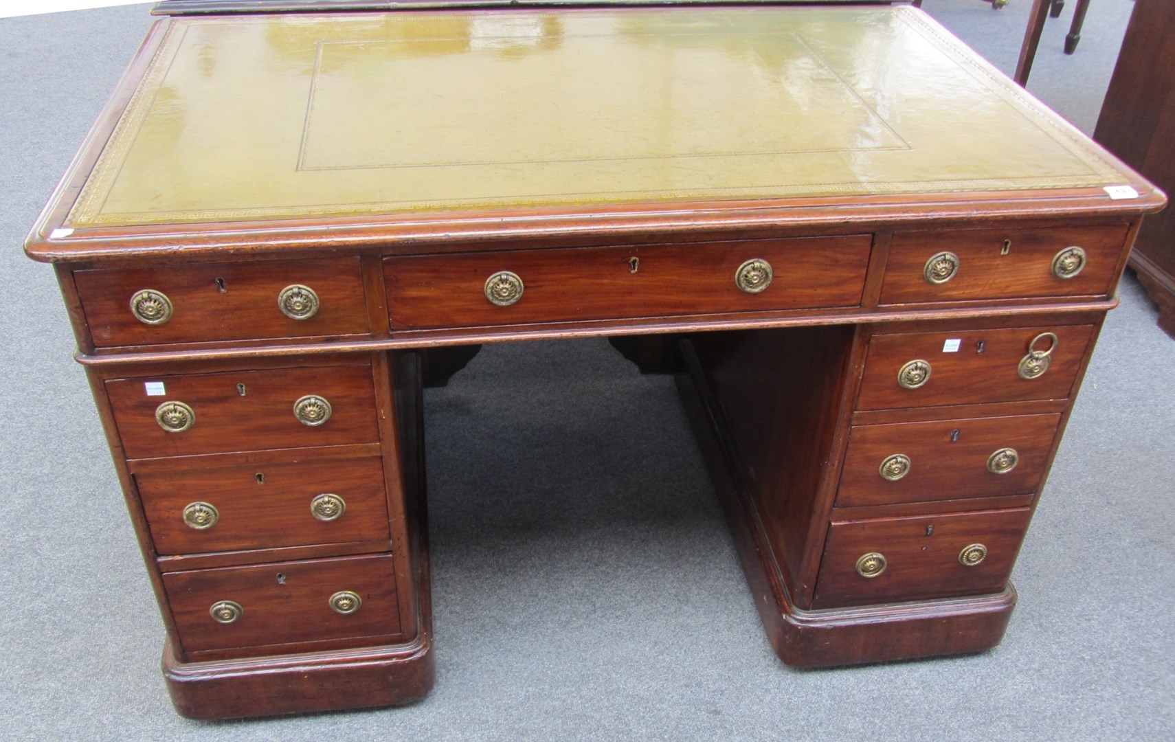 Appraisal: A Victorian mahogany pedestal desk with nine drawers about the