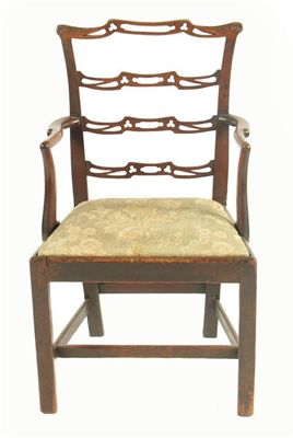 Appraisal: A George III mahogany open armchair the pierced ladder back