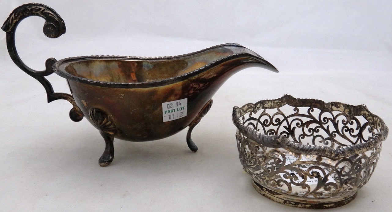 Appraisal: A silver bonbon bowl with scroll pierced decoration beneath a