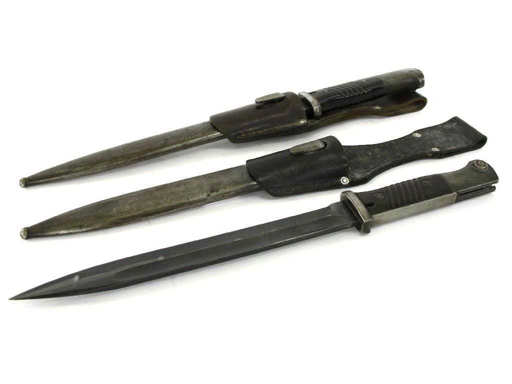 Appraisal: Good pair of bayonets within steel and leather scabbards one