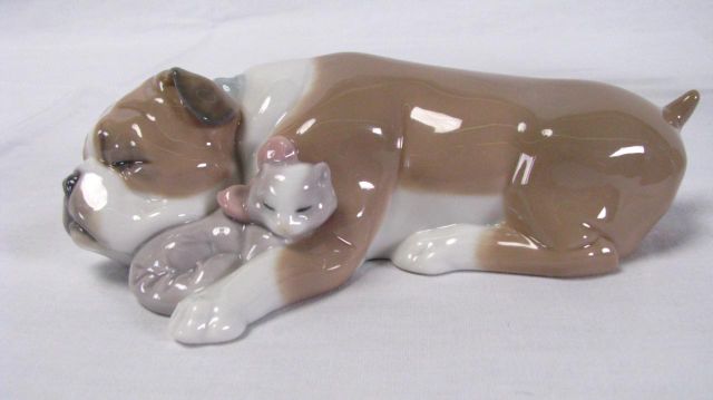 Appraisal: Lladro figurine Unlikely Friends depicting bulldog with kitten issued in