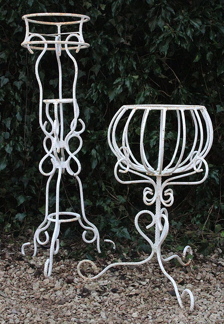 Appraisal: TWO WROUGHT IRON PLANT STANDS cm x cm in height