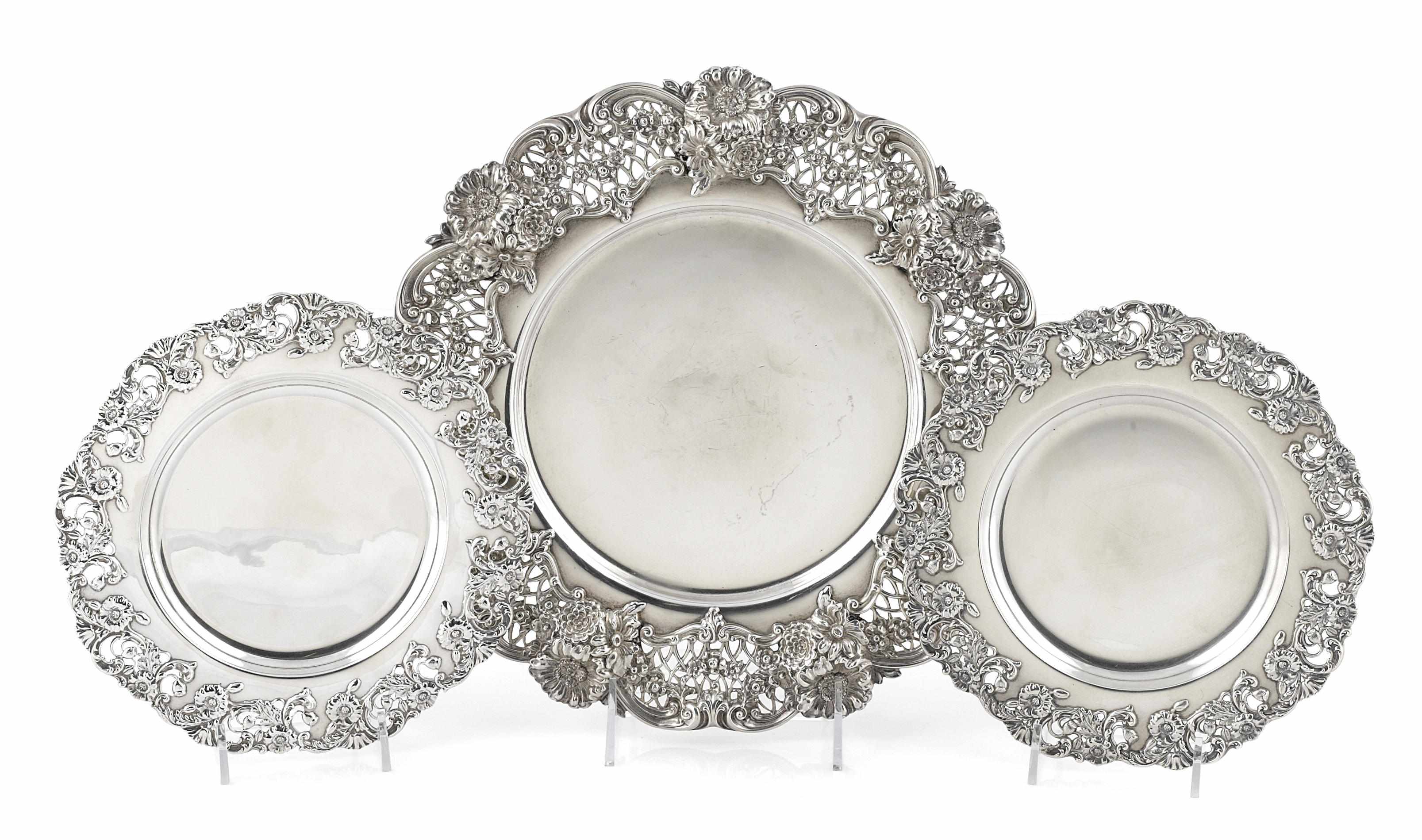 Appraisal: An assembled group of American sterling silver floral-decorated pierced place