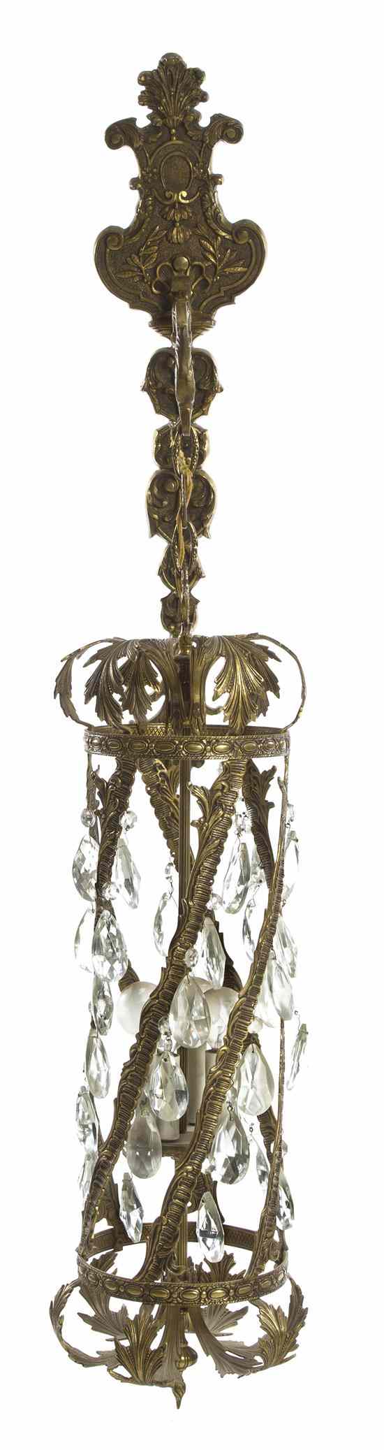 Appraisal: A Continental Gilt Metal Lantern of twisting cylindrical form with