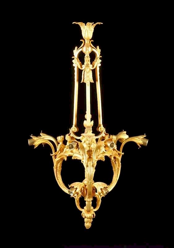 Appraisal: A NAPOLEON III FIGURAL GILT BRONZE NINE-LIGHT CHANDELIER THIRD QUARTER