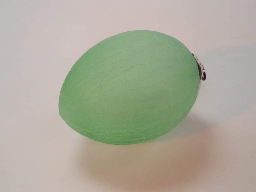 Appraisal: A green crackle glass bauble with metal hanging mount