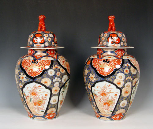 Appraisal: PAIR IMARI COVERED JARS Traditional iron red and cobalt Imari