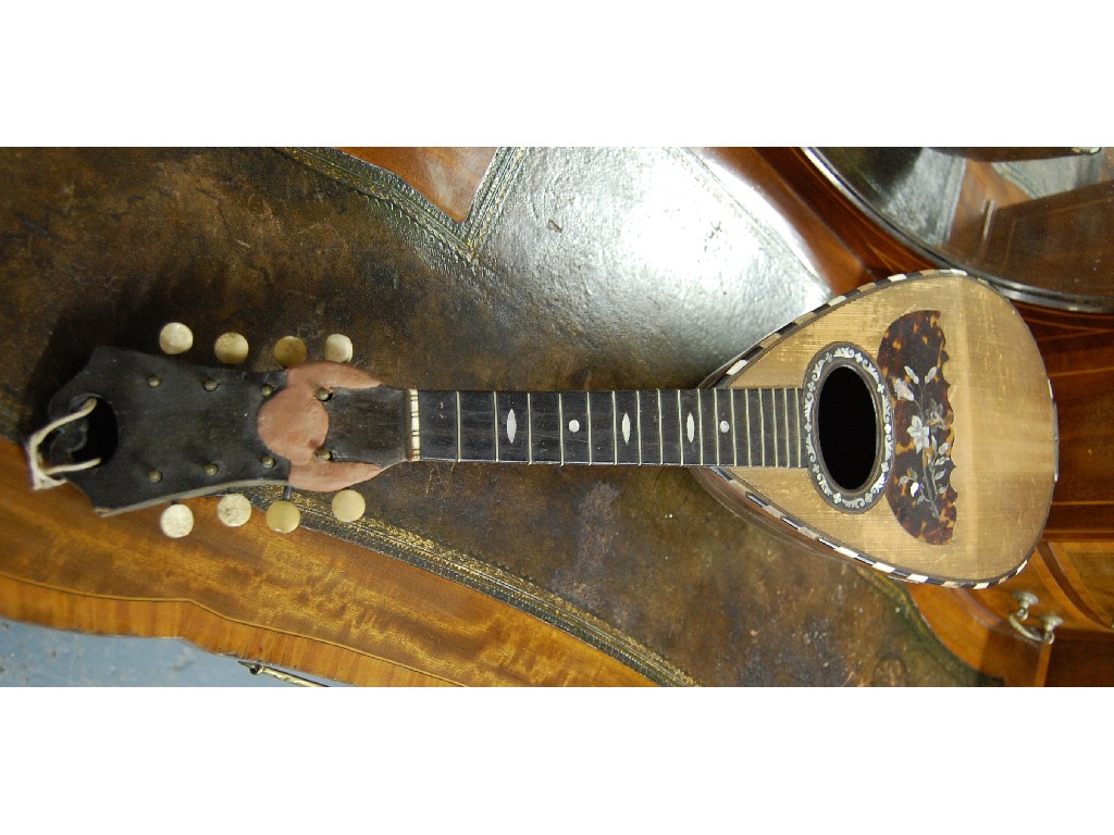 Appraisal: th century Italian mandolin inlaid with tortoiseshell and mother-of-pearl and