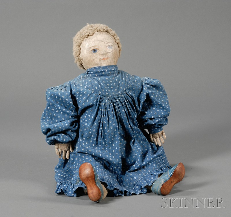 Appraisal: Folk Art Doll Wearing a Blue Dress and Shoes America