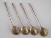 Appraisal: A set of four Russian silver teaspoons with incised decorated