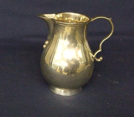 Appraisal: George VI silver sparrow beak cream jug with scroll handle