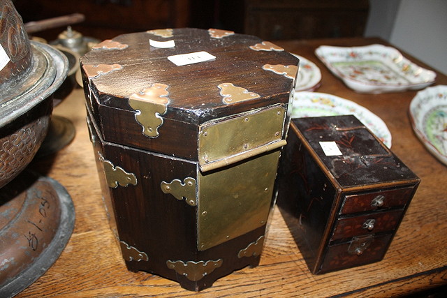 Appraisal: A CHINESE BRASS BOUND OCTAGONAL CASKET lined with rice paper