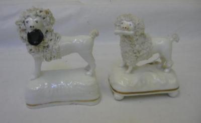 Appraisal: A VICTORIAN STAFFORDSHIRE PORCELAIN FIGURE modelled as a poodle standing