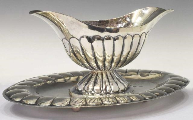 Appraisal: Spanish Colonial style silver content unknown gravy boat bearing spurious