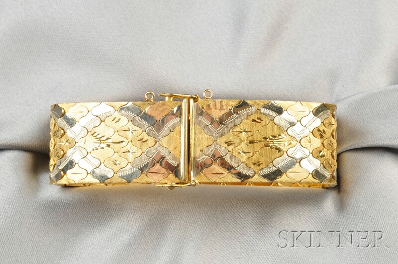 Appraisal: kt Tricolor Gold Bracelet the wide strap with engraved accents